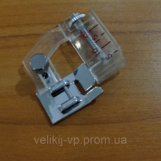 Окантовувач з регулюванням для косої бейки різної ширини.